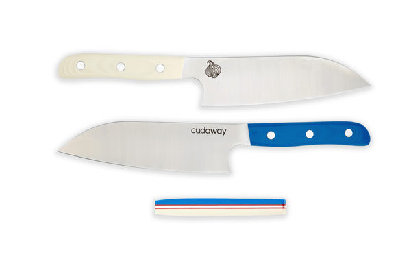 One two tone knife that is blue on left side and white on right side with red liners in the middle